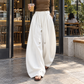 Cloud White Mooncurve Wide-Leg Pants styled at a cafe