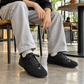 SNK Shadow Fold Trainer worn at a cafe
