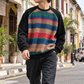 Man wearing SNK Sunset Stripe Pullover on a shophouse street