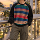 SNK Sunset Stripe Pullover styled with cargo pants, city sunset