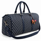 Side view of the navy truffle bag showing end panel, D-ring and strap clip